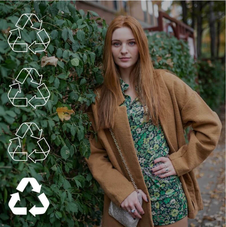 Stylish teenage girl posing by a leafy green bush wearing gently used clothing she purchased from Plato's Closet promoting secondhand shopping along with four recycling symbols